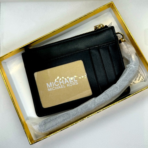 Michael Kors Blk glitter monogram wristlet coin purse
🔥STOCKING STUFFER🔥 NWT 🔥 - Picture 2 of 3